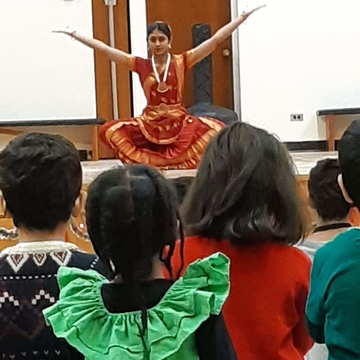 children enjoying traditional dancing at the Multi Cultural Womens Organization celebration
